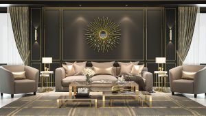 Opulent living room interior by Tiffany Siegel, featuring a sophisticated palette with black paneled walls accented by gold trim, an array of plush seating in rich tones, a striking sunburst wall mirror as the focal point, and elegant gold and glass side tables, embodying luxury and contemporary design.